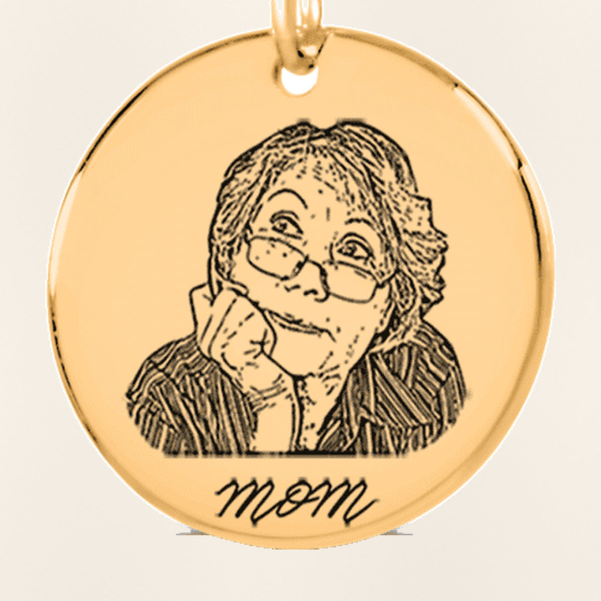 Porte-clés Portrait Personnalisé Gravé : gros plan du motif gravé, exemple de personnalisation en finition dorée.